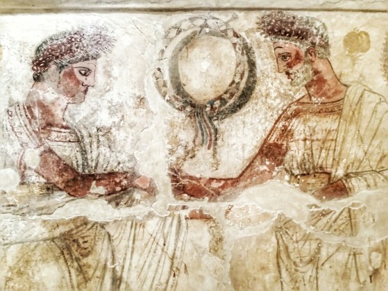 Tomba della Finanza. Il defunto tende la mano verso un uomo anziano con la barba, forse un antenato.